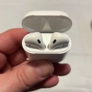 Apple air pods I upgraded no longer needed works great and charges